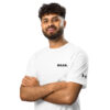 A curly-haired, bearded man smiles with his arms crossed, wearing a white Under ArmourⓇ athletic t-shirt with BAAS. on the chest and the brands logo on the sleeve, standing against a white background.